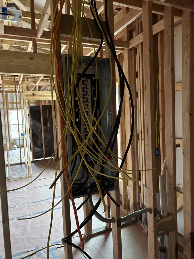 New construction electrical rough-in with panel and home-run wiring in Joplin, Missouri
